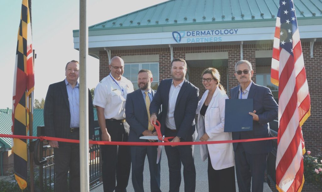 Image of company ribbon cutting