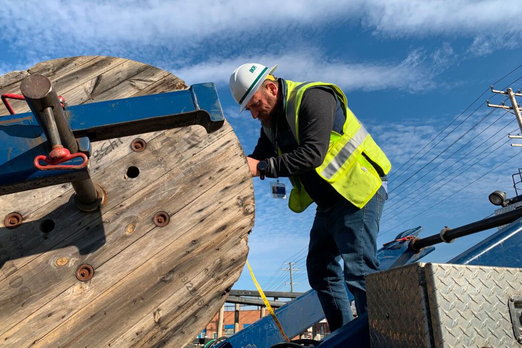 Man working with cabling