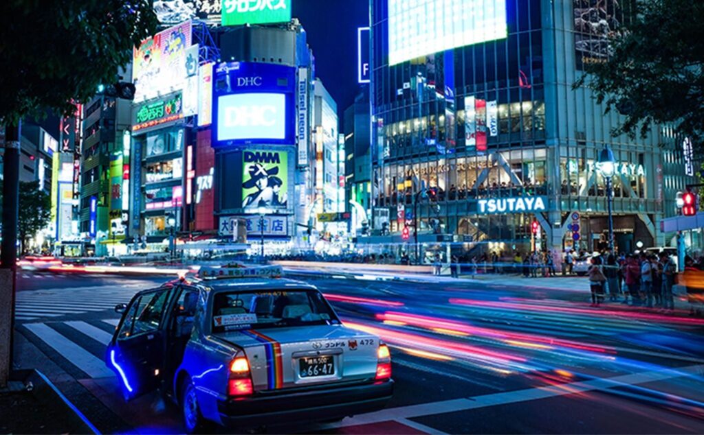 Night photo of international city with car lights lit up
