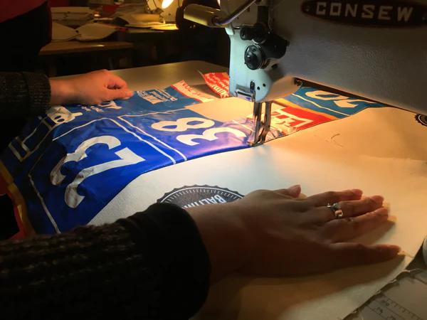 person using a sewing machine
