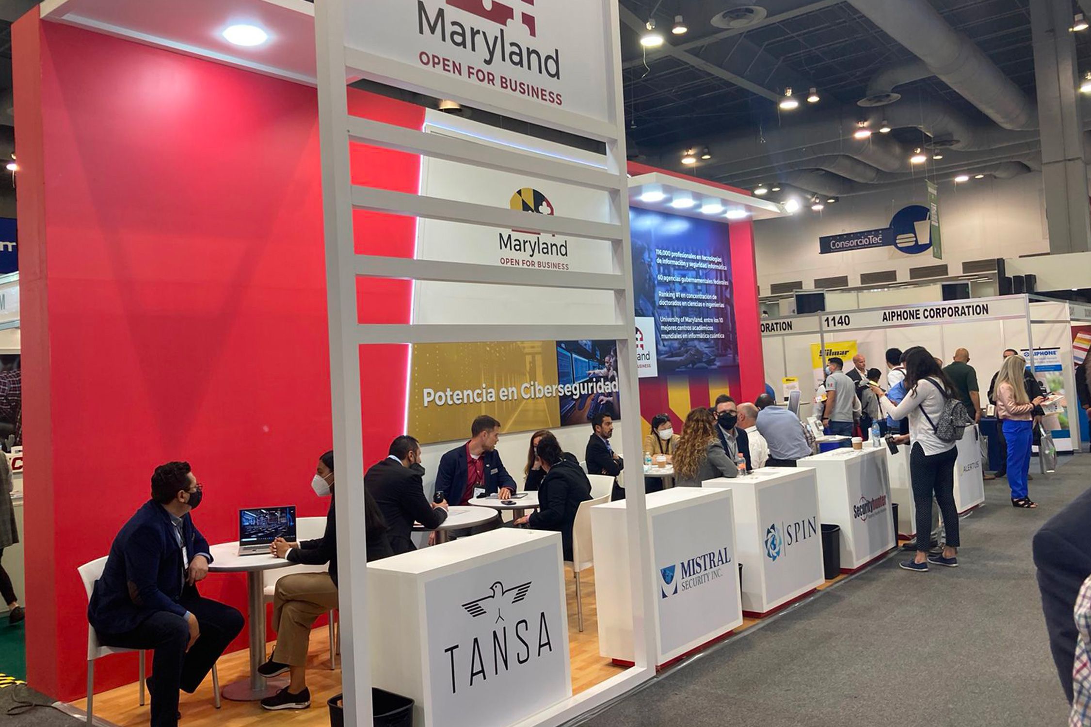 Companies mingling in a tradeshow booth
