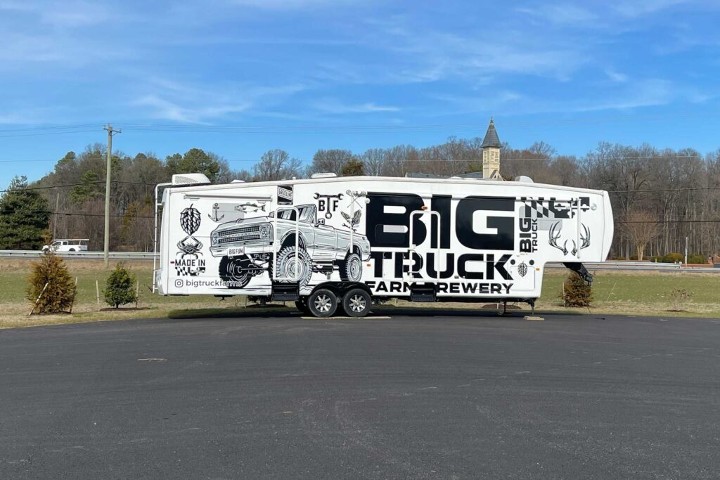 Trailer with Big Truck Farm Brewery wording and an image of a truck
