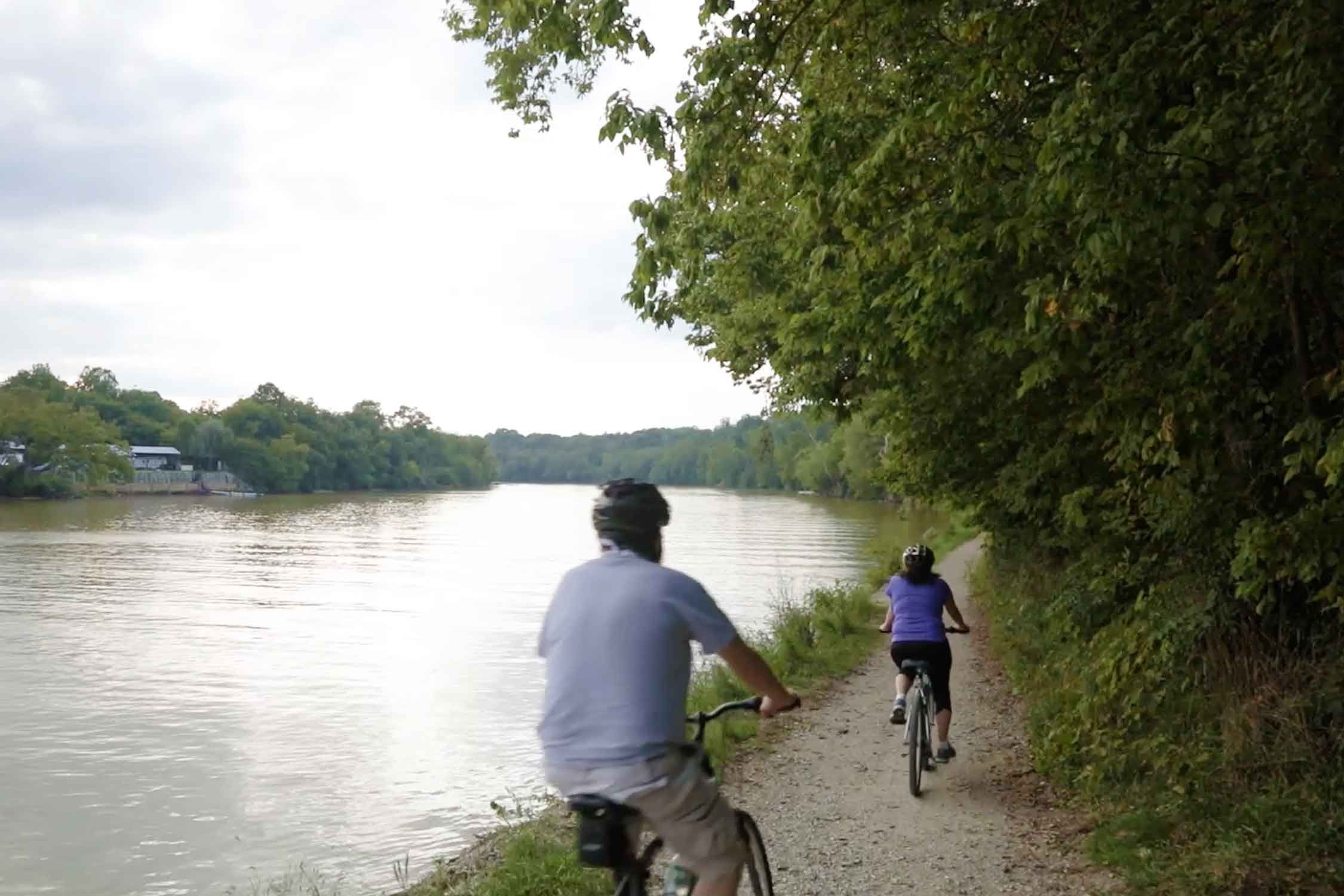 Bicyclists riding along the C&O Canal