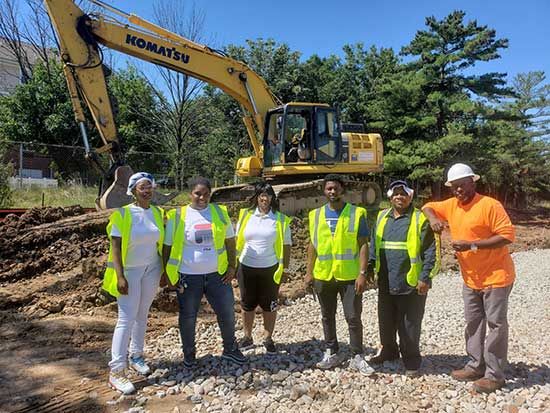 students being trained on heavy machinery