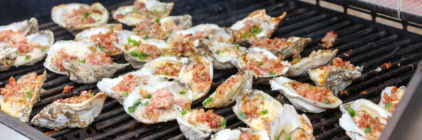 Image of oysters being grilled