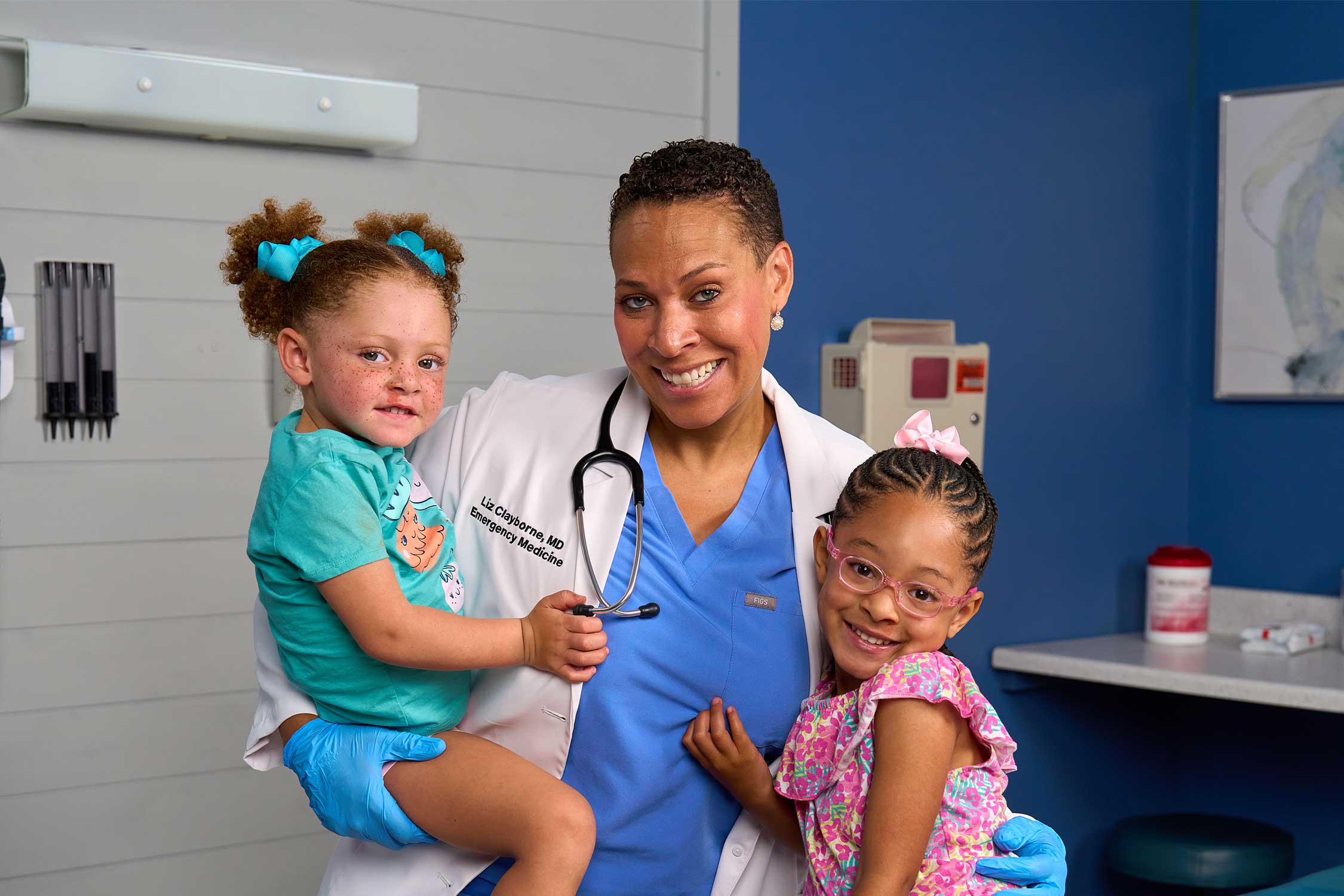 Dr. Clayborne of NasaClip poses with her daughters