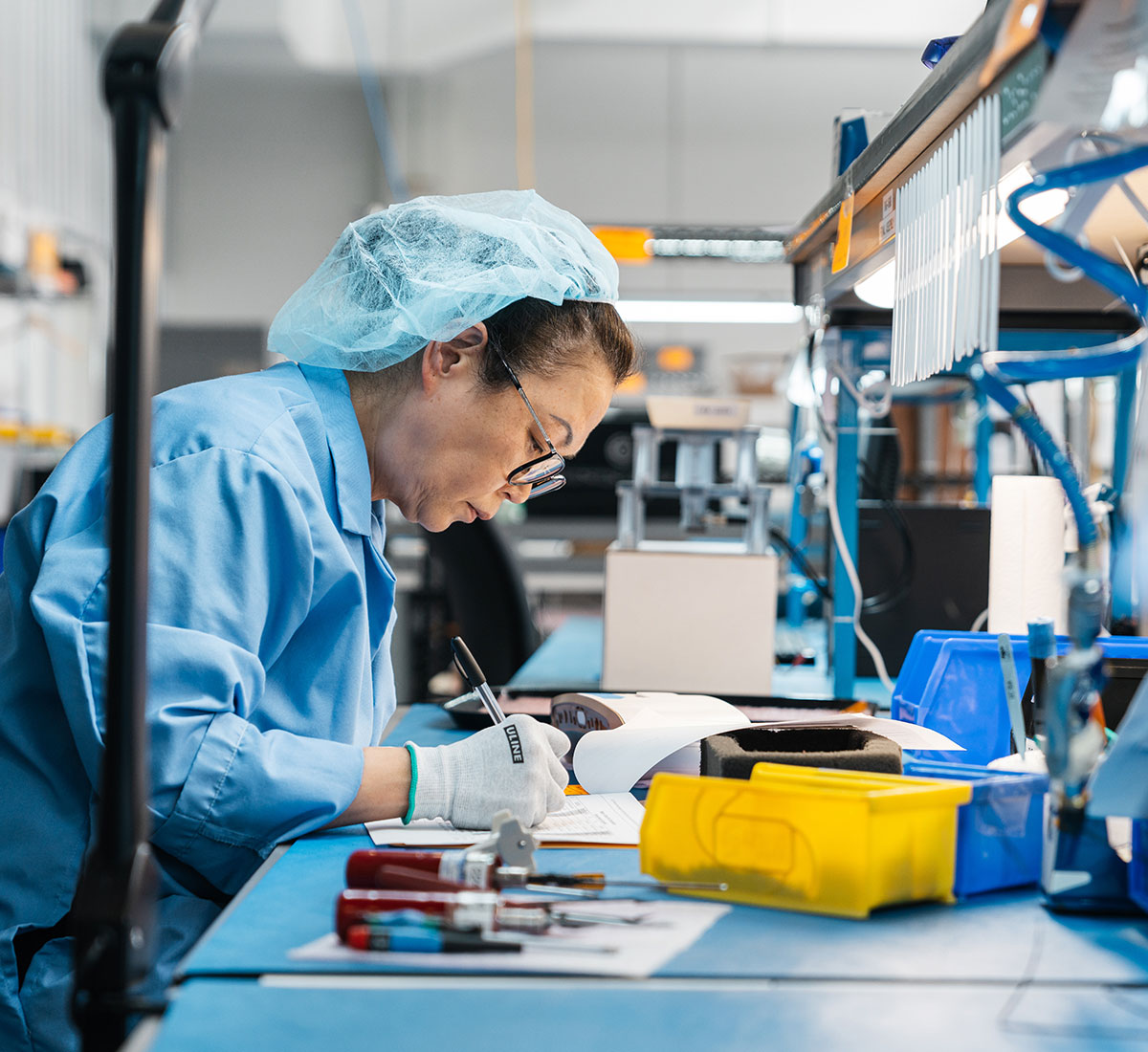A woman working in a lab
