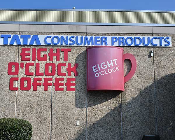 Photo of the Eight O'Clock Coffee logo on the outside of its Maryland building