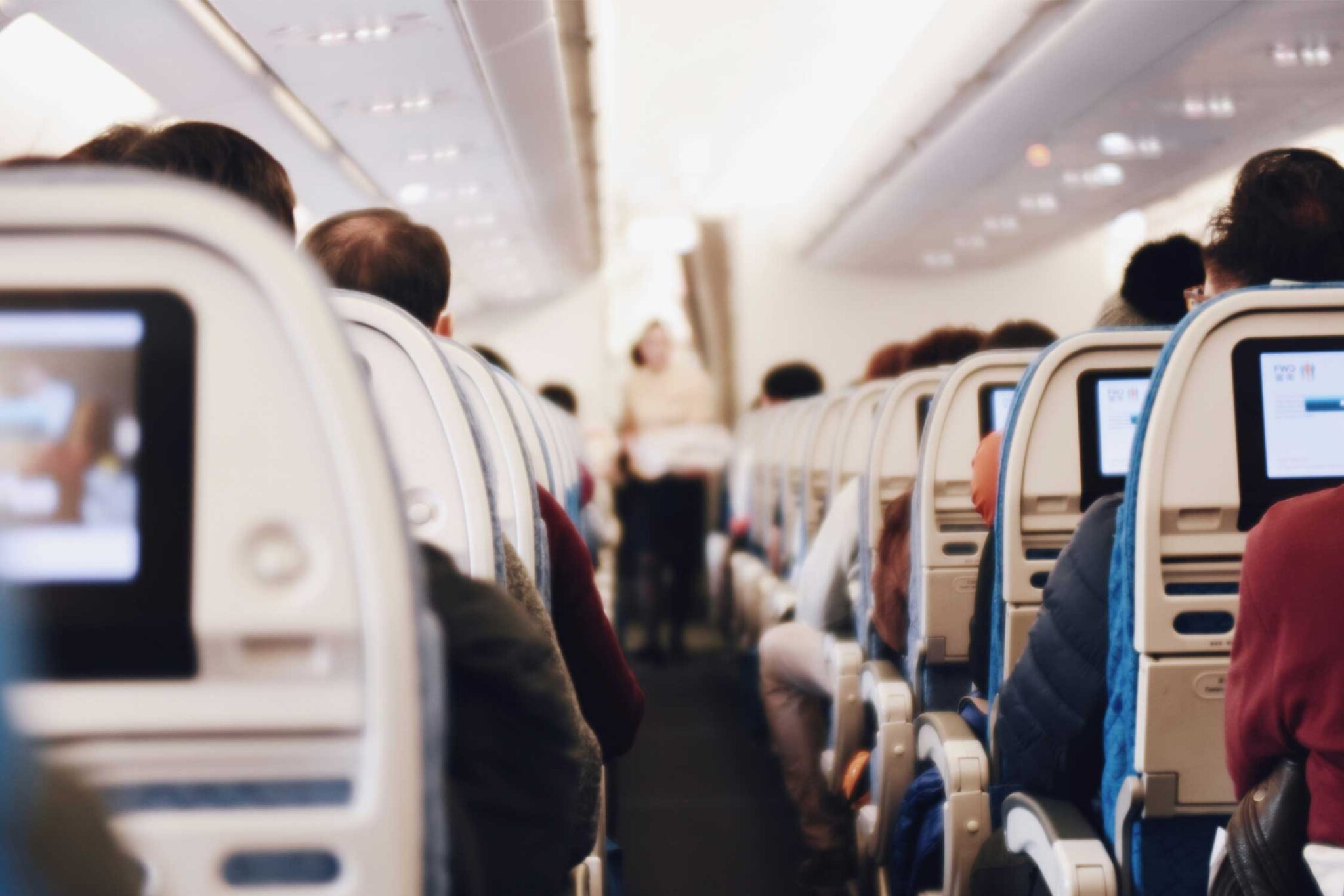 travelers inside a plane