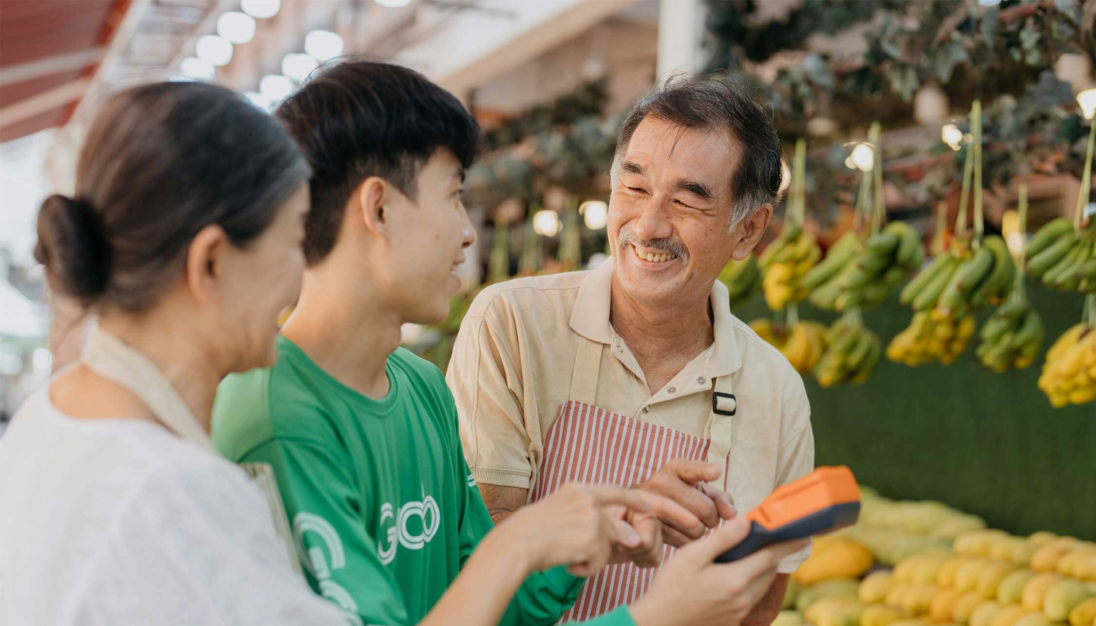 international family works in a small shop