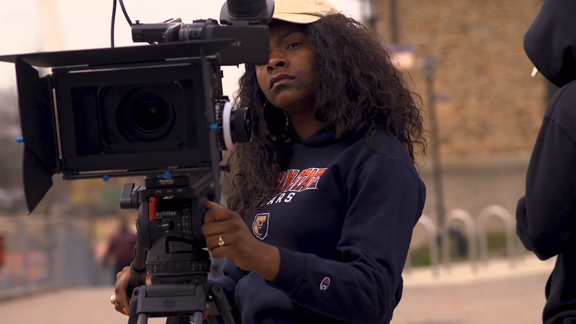 person holding a video camera