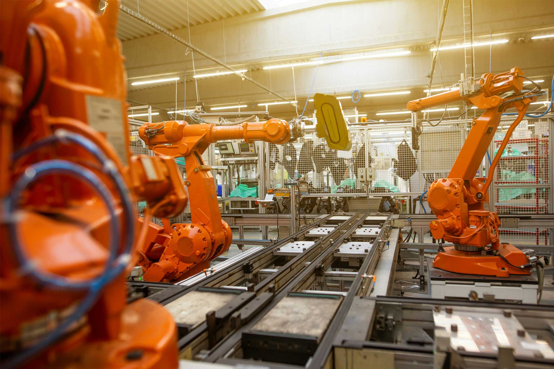 Automatic robots in an industrial factory